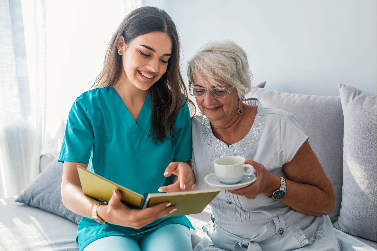 Patient and caregiver learning wound care techniques